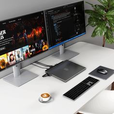 a desktop computer sitting on top of a white desk next to a keyboard and mouse