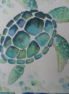 a watercolor painting of a sea turtle in blue, green and white colors on paper