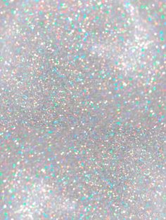 white and silver glitter background with lots of small dots on the bottom half of the image