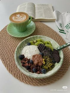 a bowl of cereal, yogurt and fruit with a cup of coffee