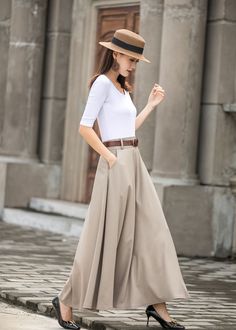 "Get dressed and out of the door in classic good looks with this pleated Long maxi skirt, crafted with soft cotton linen fabric, featuring pleated waist detail and two big pockets. DETAIL * More color https://etsy.me/3fsncV4 * 50% linen, 50% cotton * Has no lining, Not see through * Two pockets * High waistband * Back elastic waistband * Right Side zipper closure * Ankle length * Perfect for spring and summer, autumn * Wash by hand or machine with cold water *The model is 170 cm (5′7″) tall with Beige Maxi Length Lined Skirt Bottoms, Elegant Full-length Cotton Skirt, Summer Full Length Maxi Skirt For Workwear, Elegant Full Length Solid Color Maxi Skirt, Summer Workwear Full-length Maxi Skirt, Summer Workwear Maxi Skirt, Spring Solid Color Full Length Maxi Skirt, Spring Solid Color Full-length Maxi Skirt, Beige Maxi Length Lined Skirt