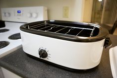 a toaster oven sitting on top of a counter