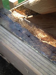 some wood that has been cut off and is being used as a roofing material