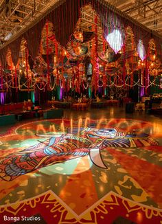 an elaborately decorated room with lights and chandeliers