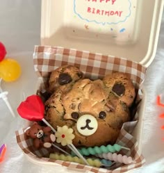 a birthday cake in a box on a table