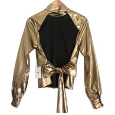 Revolve Lpa Gold Blouse Long Sleeved Bow Naked Back Brand New! Beautiful Top Never Used Made With A Metallic Soft Fabric Perfect For Night Time! Unfortunately In The Front Shoulder Has A Gold Discoloration, Other Than That In New Condition Lovely Gold Belt Wrap To Point Your Waist! New With Tags. Chic Metallic Crop Top For Spring, Trendy Gold Evening Top, Gold Stretch Crop Top For Spring, Trendy Gold Blouse For Night Out, Trendy Gold Tops For Fall, Chic Gold Stretch Top, Trendy Gold Stretch Tops, Chic Fall Party Crop Top, Chic Gold Blouse For Night Out