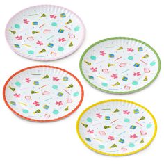 three paper plates with different designs on them