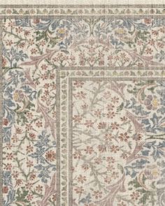 an area rug with floral designs on it