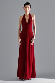 Indulge in the luxurious elegance of the dress. Sumptuous velvet fabric and a seductive front slit elevate this dress to a statement piece. Perfect for a black-tie event or a night out, this dress will make you feel like a high-end fashion icon. Red Halter Dress Long, Elegant Halter Dress, Sloane Sutherland, Halter Red Dress, Velvet Floor Length Dress, Sum Dresses, Halter Dress Formal, Sweetheart Neck Dress, Dream Prom Dress