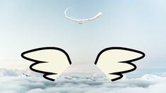 an image of two wings flying above the clouds