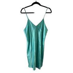 Vintage Slip Nightgown Womens Slip Comes From A Smoke Free, Pet Friendly Home Womens Large Brand New With Tags Photos Are Part Of The Items Description Measurements Are: 19.5 Inches Underarm To Underarm 38 Inches From Top To Bottom Teal Blue Polyester Check Out My Other Items In My Store! Aoap Satin V-neck Mini Dress For Sleep, Satin V-neck Bedtime Dress, Summer Satin V-neck Nightgown, Green V-neck Slip Dress For Daywear, Green Summer Sleepwear For Night, V-neck Slip Dress For Spring Sleepover, Green Spaghetti Strap Dress For Night, Green Spaghetti Strap Night Dress, Green V-neck Sleepwear