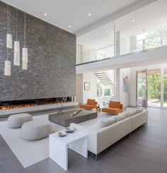 modern living room with fireplace and white furniture