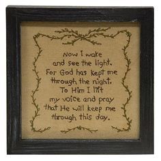 a framed cross stitch with the words, now i wake and see the light for god has kept me through the night to him