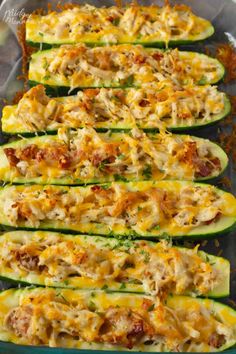 zucchini stuffed with meat and cheese in a baking dish