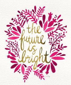 the future is bright written in gold and pink on white paper with leaves around it