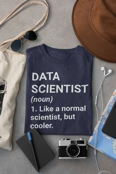 a t - shirt that says data scientist on it next to other items and accessories