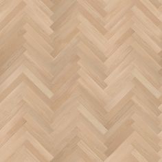 an image of wood flooring that looks like herringbones