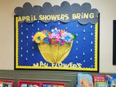 a bulletin board with flowers in the rain