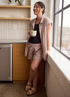 Growing a baby? In *this* heat?? You need some breathable, lightweight shorts to get you through the seasons. These ones are winners thanks to that relaxed silhouette, third-trimester-approved waistband, and oversized front pockets (because every mom needs ‘em). Pair them with our Linen Top and you’re all set. 55% linen / 45% rayon Machine wash cold (gentle cycle only) with like colors. Only non-chlorine bleach if needed. Hang to dry. Iron low heat. Ideal for second and third trimester Inseam: 4 How To Wear Shorts, 33 Weeks Pregnant, Summer Pregnancy Outfits, 30 Weeks Pregnant, Mom Needs, This Heat, Summer Pregnancy, Trimesters Of Pregnancy, Pocket Shorts