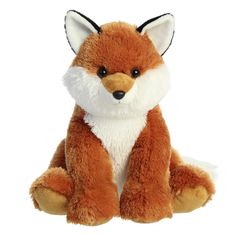 a small stuffed fox sitting on the ground