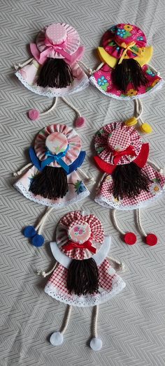 several hats are laid out on a bed