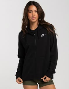 Nike Sportswear Club Zip-Up Fleece Hoodie. Club Fleece Sweatshirts, Universally Loved For Their Coziness And Consistency, Are For Everyone. Always Soft And Made With A Relaxed Fit, They're Basics That Help You Do More. This Full-Zip Option Allows You To Regulate Your Temp On The Fly. Zip It Up When The Wind Is Howling Or Leave It Open To Show Off Your Favorite Tees And Tops. Ribbing At The Hem And Cuffs Is Soft And Stretchy For Easy Layering. Jersey-Lined 3-Panel Hood Feels Soft And Smooth. Embroidered Futura Logo. Flat Drawcord. Front Pocket. 80% Cotton, 20% Polyester. Machine Wash. Imported. Model Is Wearing A Size Medium. Model Measurements:height: 5'6" Bust: 32"waist: 26"hips: 35" Nike Fleece Moisture-wicking Hoodie, Nike Activewear With Drawstring Hood For Gym, Nike Moisture-wicking Hoodie Activewear, Nike Sports Hoodie Activewear, Nike Athleisure Activewear With Drawstring Hood, Gym Hoodie With Ribbed Cuffs, Fleece Activewear With Drawstring Hood, Fleece Hoodie For Workout In Fall, Fleece Hoodie For Fall Workouts