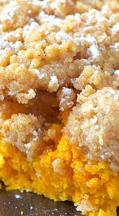 a close up of a cake with crumbs on it