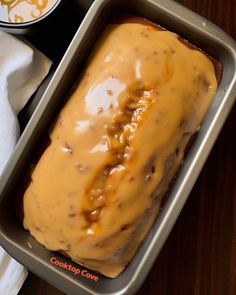 a loaf of bread covered in caramel sauce