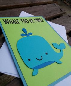 a card with a blue whale on it