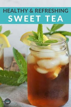 two mason jars filled with iced tea and lemon slices