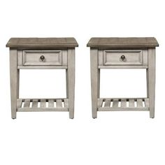 two white nightstands with one drawer open and the other closed, both side by side