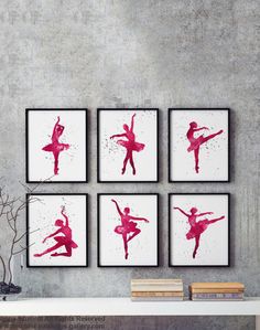 four framed ballet prints on a wall above a fireplace