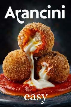 Three arancini balls stacked, one with melted cheese oozing out, on a bed of tomato sauce. Arancini Balls Recipes Easy, Easy Arancini Balls, Rice Snack Recipes, Italian Secondi Recipes, Authentic Italian Side Dishes, Popular Recipes For Dinner, Arancini Balls Recipes, Italian Starters Appetizers, Arancini Recipe Easy