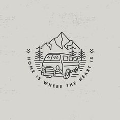 a van with mountains and trees in the background that says home is where the heart is