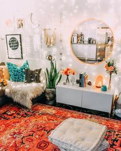 a living room filled with lots of furniture and decor on top of a red rug