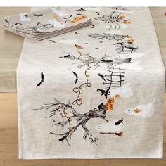 an image of a table cloth with birds on it