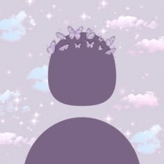 the silhouette of a person with butterflies on their head and clouds in the sky behind them