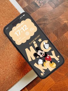 an iphone case with mickey mouse on it