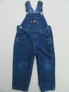 Children's Denim Bib-Overalls Average Size 4 yrs old Lying Flat Measurements :  Waist =  11 1/2"  Leg Inseam = 14" Adjustable Shoulder Straps Front, Back & Bib Pockets Convenient Leg Snaps Has Some Fading at the Knees Good Pre-Owned Condition Leg Snaps, Denim Jumper, Bib Overalls, Girls Denim, Blue Denim Jeans, Shoulder Straps, Blue Jeans, Painter, Boy Or Girl