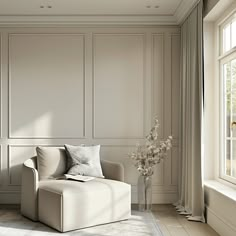 a living room filled with furniture and windows next to a wall covered in white paneling