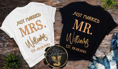 two t - shirts that say just married, mr and mrs with gold lettering on them