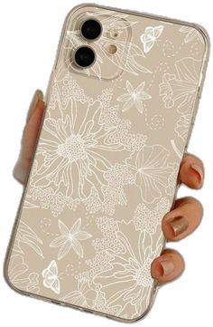 a woman's hand holding an iphone case with flowers and butterflies printed on it