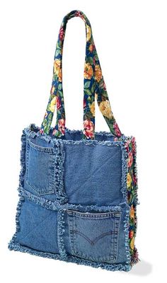 a denim bag with flowers on it