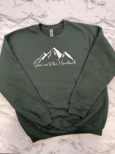 Gildan brand sweatshirt 50% cotton 50% polyester  Unisex sizing  Runs true to size  This soft crewneck is a great gift for anyone who loves to hike or go on adventures in the mountains! Outdoor Cotton Sweater With Letter Print, Fall Crew Neck Sweatshirt For Outdoor, Fall Outdoor Crew Neck Sweatshirt, Outdoor Fleece Sweatshirt With Graphic Print, Fall Hiking Sweatshirt With Letter Print, Outdoor Graphic Print Fleece Sweatshirt, Fall Crew Neck Sweatshirt For Hiking, Fall Hiking Crew Neck Sweatshirt, Fall Hiking Sweatshirt Crew Neck