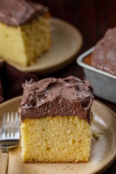 a piece of cake with chocolate frosting on a plate