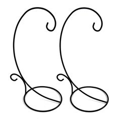 the letter c is made out of wire and has an oval shape with swirls on it