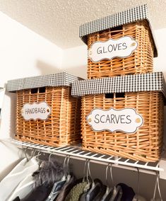 three baskets with labels on them are sitting on a shelf in the closet next to shoes