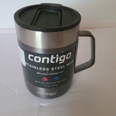 a stainless steel coffee mug with contigo logo on the side and lid sitting on a white surface