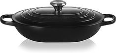 a black casserole on a white background