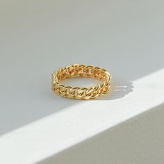 *Buy 2 items, Get 15% OFF your order. Coupon applied at checkout.* A modern and timeless gold curb chain ring. This curb chain ring looks great stacked with your favorites or on its own. Made from durable materials that are perfect for everyday wear! - Band Thickness: 4.1 mm. - Loose link chain - Made in gold vermeil: a thick 18k gold layer on sterling silver. - 1 Year warranty GIFT WRAP AVAILABLE TO PURCHASE: https://www.etsy.com/listing/902780367/gift-wrap-for-gift-jewelry-pouch-jewelry?ref=sh Cuban Link Ring, Gold Chain Ring, Chain Ring Gold, Herkimer Diamond Earrings, Gold Curb Chain, Link Ring, 18k Gold Chain, Layered Rings, Stone Dangle Earrings